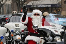 Santa Claus riding a motorcycle