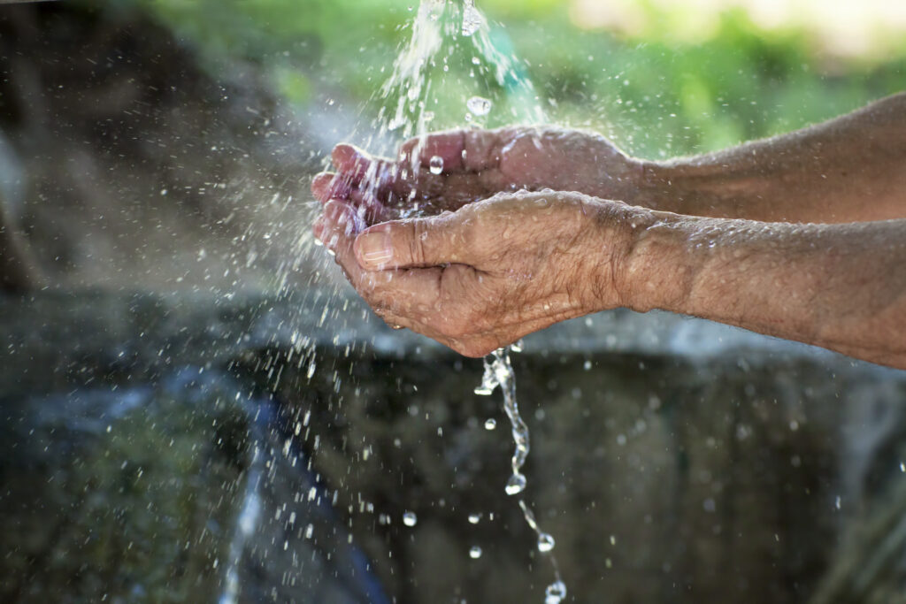 Man washing his hand