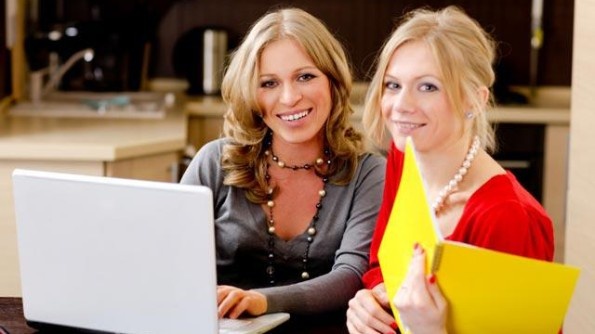 Young-women-using-laptop-computer-for-small-business-jpg